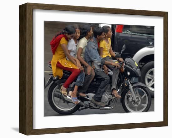 Boy Rides a Motorbike with Four Girls, as it Drizzles in Hyderabad, India-null-Framed Photographic Print