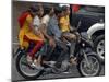 Boy Rides a Motorbike with Four Girls, as it Drizzles in Hyderabad, India-null-Mounted Photographic Print