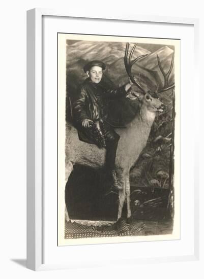 Boy Riding Stuffed Deer-null-Framed Art Print