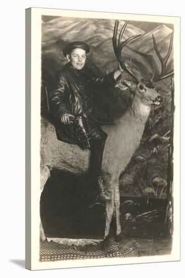 Boy Riding Stuffed Deer-null-Stretched Canvas