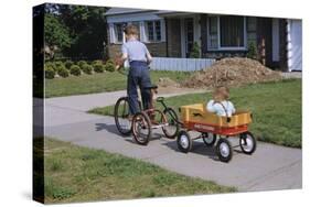 Boy Riding Tricycle and Towing Wagon-William P. Gottlieb-Stretched Canvas