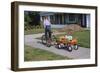 Boy Riding Tricycle and Towing Wagon-William P. Gottlieb-Framed Photographic Print