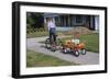 Boy Riding Tricycle and Towing Wagon-William P. Gottlieb-Framed Photographic Print