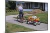 Boy Riding Tricycle and Towing Wagon-William P. Gottlieb-Mounted Photographic Print