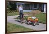 Boy Riding Tricycle and Towing Wagon-William P. Gottlieb-Framed Photographic Print