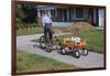 Boy Riding Tricycle and Towing Wagon-William P. Gottlieb-Framed Photographic Print