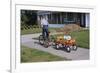 Boy Riding Tricycle and Towing Wagon-William P. Gottlieb-Framed Photographic Print