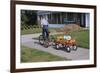 Boy Riding Tricycle and Towing Wagon-William P. Gottlieb-Framed Photographic Print