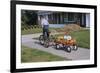 Boy Riding Tricycle and Towing Wagon-William P. Gottlieb-Framed Photographic Print