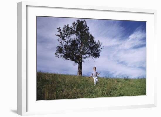 Boy Running Down Hill-William P. Gottlieb-Framed Photographic Print