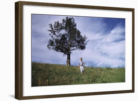 Boy Running Down Hill-William P. Gottlieb-Framed Photographic Print