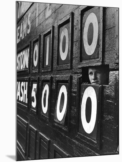 Boy Running Scoreboard at Griffith Stadium During the Baseball Game-Hank Walker-Mounted Photographic Print