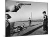 Boy's Hand Holding a Toy Six Shooter Pistol During a Game of "Cops and Robbers"-Howard Sochurek-Mounted Photographic Print