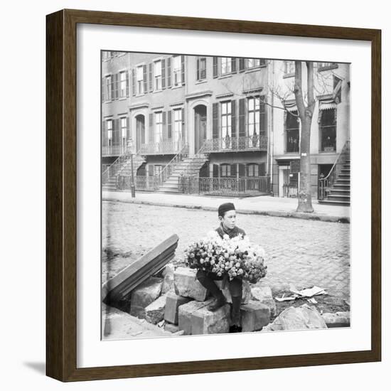 Boy Selling Flowers-null-Framed Photographic Print