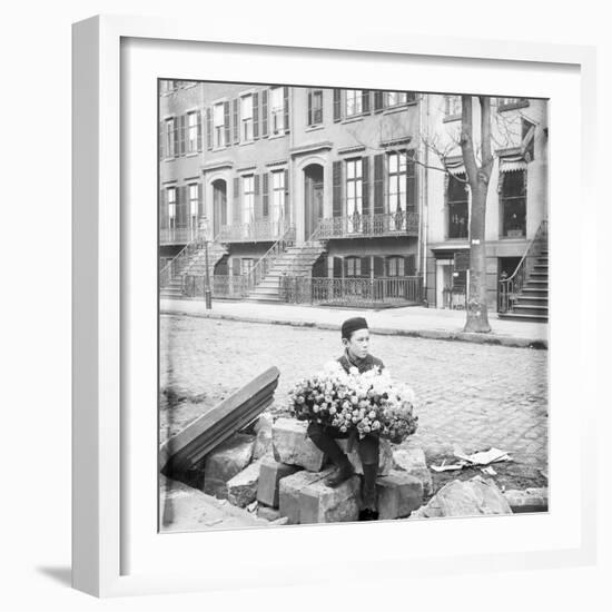 Boy Selling Flowers-null-Framed Photographic Print