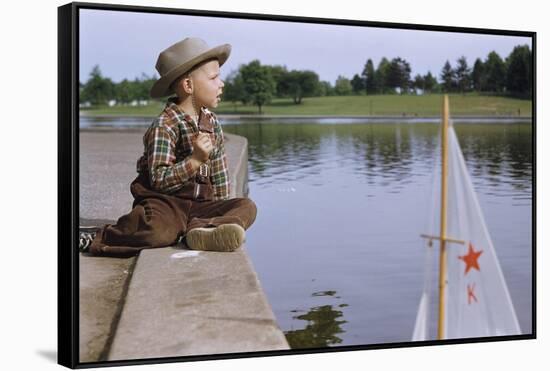 Boy Sitting by Lake in Cowboy Hat-William P. Gottlieb-Framed Stretched Canvas