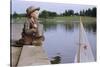 Boy Sitting by Lake in Cowboy Hat-William P. Gottlieb-Stretched Canvas