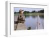 Boy Sitting by Lake in Cowboy Hat-William P. Gottlieb-Framed Photographic Print