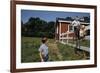 Boy Sitting on Fence Waving to Friend-William P. Gottlieb-Framed Photographic Print