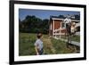 Boy Sitting on Fence Waving to Friend-William P. Gottlieb-Framed Photographic Print