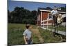 Boy Sitting on Fence Waving to Friend-William P. Gottlieb-Mounted Photographic Print