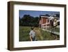 Boy Sitting on Fence Waving to Friend-William P. Gottlieb-Framed Photographic Print