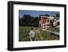 Boy Sitting on Fence Waving to Friend-William P. Gottlieb-Framed Photographic Print