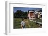 Boy Sitting on Fence Waving to Friend-William P. Gottlieb-Framed Photographic Print