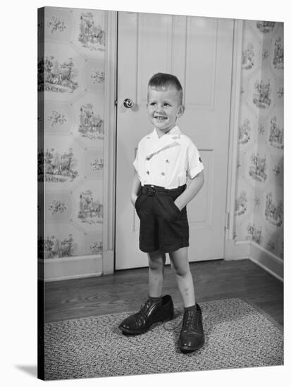 Boy Standing in Oversized Shoes-Philip Gendreau-Stretched Canvas
