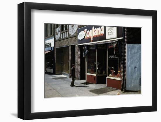 Boy Standing Outside Toyland-William P. Gottlieb-Framed Photographic Print