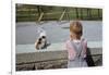 Boy Standing with Kitten in Schoolyard-William P. Gottlieb-Framed Photographic Print