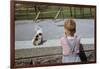 Boy Standing with Kitten in Schoolyard-William P. Gottlieb-Framed Photographic Print