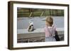 Boy Standing with Kitten in Schoolyard-William P. Gottlieb-Framed Photographic Print