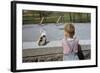 Boy Standing with Kitten in Schoolyard-William P. Gottlieb-Framed Photographic Print