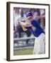 Boy Swinging a Baseball Bat on a Field-null-Framed Photographic Print