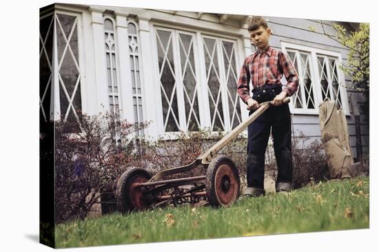 Boy Unhappily Mowing Lawn-William P. Gottlieb-Stretched Canvas