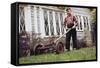 Boy Unhappily Mowing Lawn-William P. Gottlieb-Framed Stretched Canvas