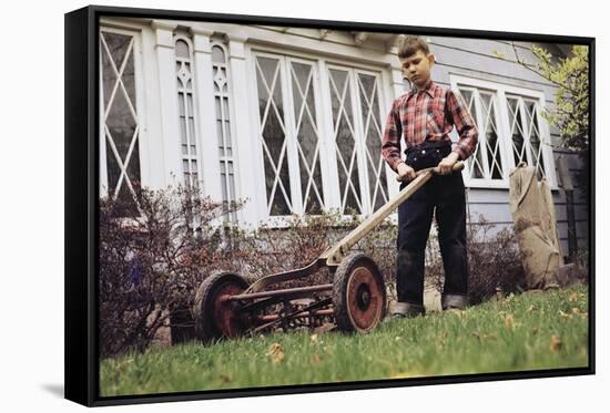 Boy Unhappily Mowing Lawn-William P. Gottlieb-Framed Stretched Canvas