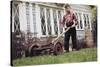 Boy Unhappily Mowing Lawn-William P. Gottlieb-Stretched Canvas