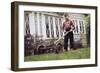 Boy Unhappily Mowing Lawn-William P. Gottlieb-Framed Photographic Print