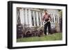 Boy Unhappily Mowing Lawn-William P. Gottlieb-Framed Photographic Print