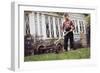 Boy Unhappily Mowing Lawn-William P. Gottlieb-Framed Photographic Print