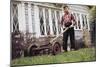 Boy Unhappily Mowing Lawn-William P. Gottlieb-Mounted Photographic Print