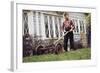 Boy Unhappily Mowing Lawn-William P. Gottlieb-Framed Photographic Print