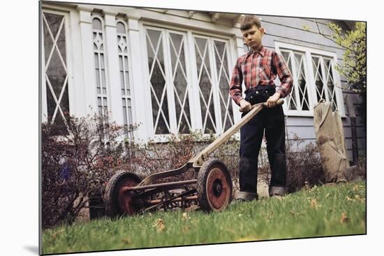 Boy Unhappily Mowing Lawn-William P. Gottlieb-Mounted Photographic Print