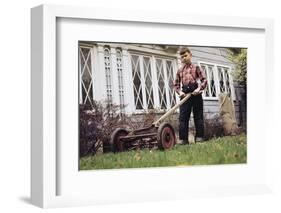 Boy Unhappily Mowing Lawn-William P. Gottlieb-Framed Photographic Print