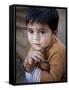 Boy Waits to Receive a Ration of Donated Rice at Food Distribution Center in Islamabad, Pakistan-null-Framed Stretched Canvas