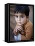 Boy Waits to Receive a Ration of Donated Rice at Food Distribution Center in Islamabad, Pakistan-null-Framed Stretched Canvas