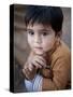 Boy Waits to Receive a Ration of Donated Rice at Food Distribution Center in Islamabad, Pakistan-null-Stretched Canvas