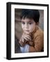 Boy Waits to Receive a Ration of Donated Rice at Food Distribution Center in Islamabad, Pakistan-null-Framed Photographic Print